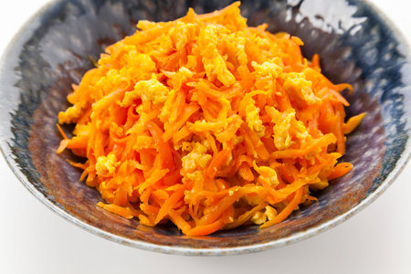 "Ninjin Shirishiri" (stir-fried shreds carrots with egg), local cuisine of Okinawa prefecture, Japan.の写真素材