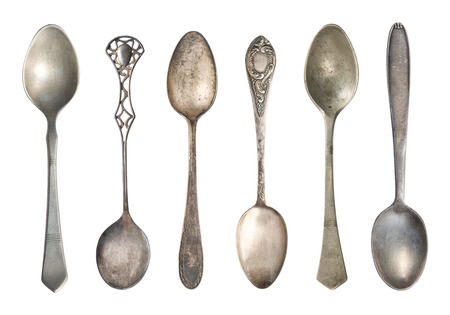 Vintage tea spoons  isolated on a white background. Retro silverware.の写真素材