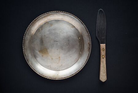 Plate and fork on a blackの写真素材