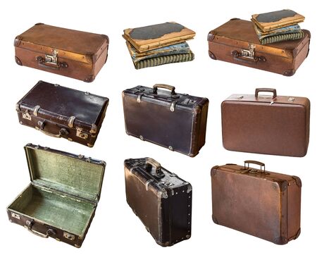 Old shabby vintage suitcases and books isolated on white background. Retro styleの写真素材