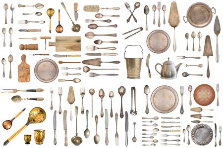 Set of beautiful antique items, old silverware. Retro. Vintage. Isolated on white background.の写真素材