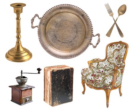 Big set of gorgeous old vintage items. Old dishes, appliances, kettles, chairs, books, silverware, candlesticks, picture frames and other things. Isolated on white background.の写真素材