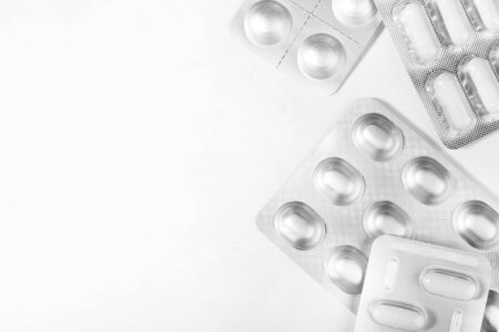Medications on white background. Concept of Health Care. Copy space.の写真素材