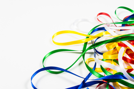 Many color ribbons on white background with copy spaceの写真素材