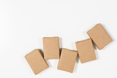 Boxes in craft paper on white background with copy space, top viewの写真素材