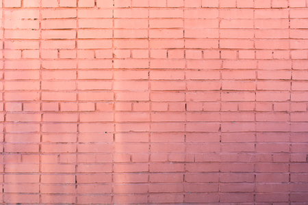 Background of the red brick wall with horizontal masonryの写真素材