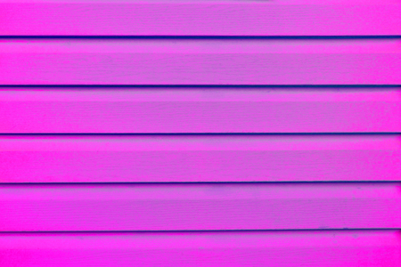 Bright magenta pink colorful empty wooden background design with copy spaceの写真素材