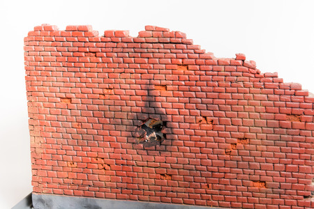 Red brick wall of diorama without people on white backgroundの写真素材