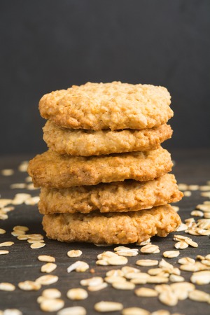 Closeup view of homemade oatmeal cookies, vertical shotの写真素材