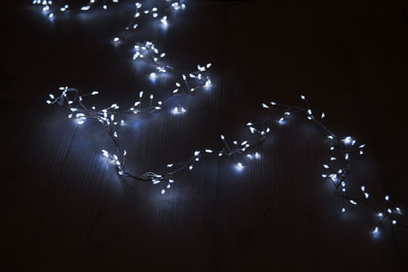 Abstract Christmas garland on dark backgroundの写真素材