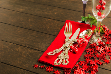 Christmas table setting with red decorations with copy spaceの写真素材