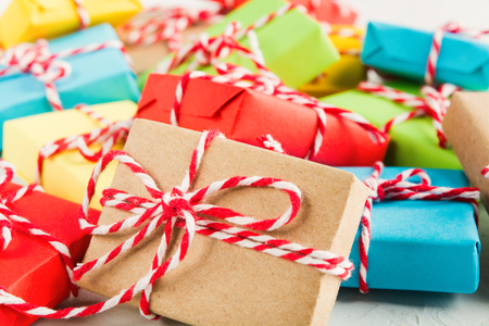 Gift box in craft paper with christmas rope with many gifts, soft focus, closeup viewの写真素材