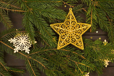 Golden star with green fir tree with decoration, flat layの写真素材