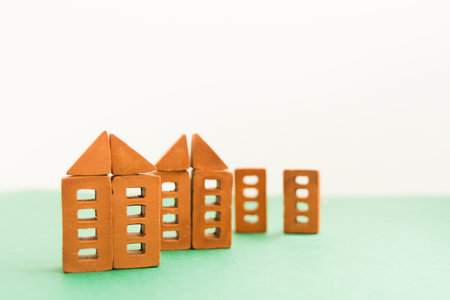 Miniature Brick Block Toy house on green background