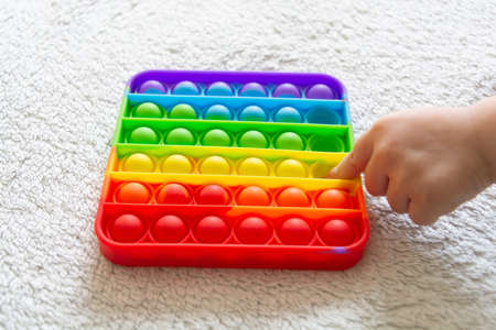 Modern trendy toy Pop it for children with flexible silicone materialの写真素材