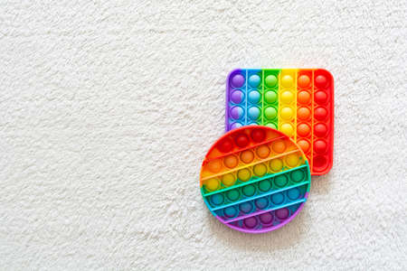 Modern trendy toy Pop it for children with flexible silicone materialの写真素材