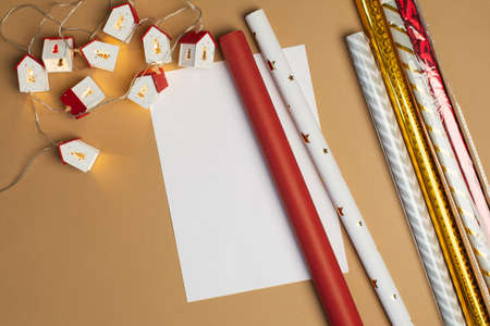 Blank paper for text with Christmas decoration on beige backgroundの写真素材