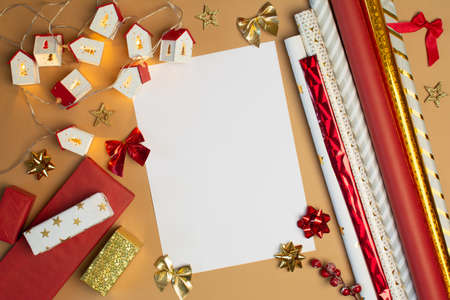 Blank paper for text with Christmas decoration on beige backgroundの写真素材