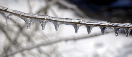 Unique frozen water dripsの写真素材