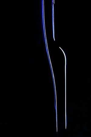 Contour of bottles on a black backgroundの写真素材