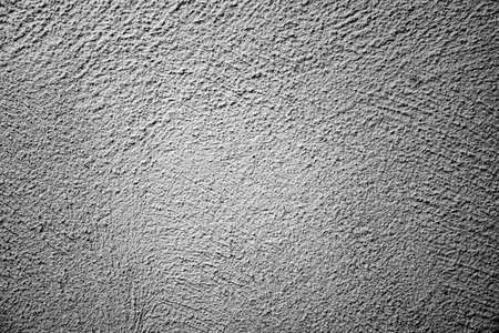 Real white concrete texture with diagonal shadowsの写真素材
