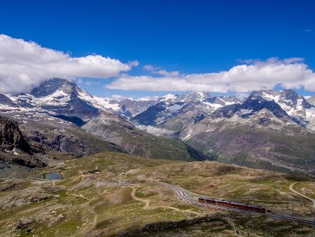 Gornergrat train and Matterhorn in the clouds - canton of Valais Switzerlandの写真素材