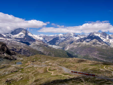 Gornergrat train and Matterhorn in the clouds - canton of Valais Switzerlandの写真素材