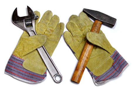Hammer, crescent wrench and pair of work glovesの写真素材
