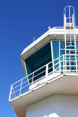 Part of aerodrome control tower with ladder, against clear skyの写真素材