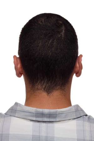 Back of man's head and neck, branded with engraved letters like on leather product, cloning conceptの写真素材