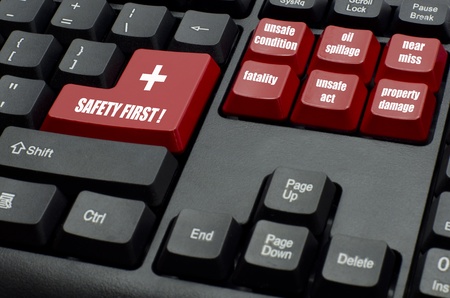safety first word with type of incidents on red and black keyboard button