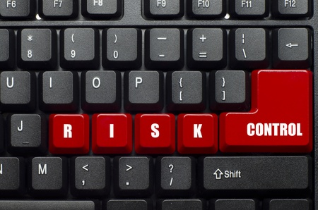 risk control word on red and black keyboard buttonの写真素材