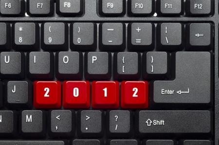 2012 new year red button word on black keyboardの写真素材