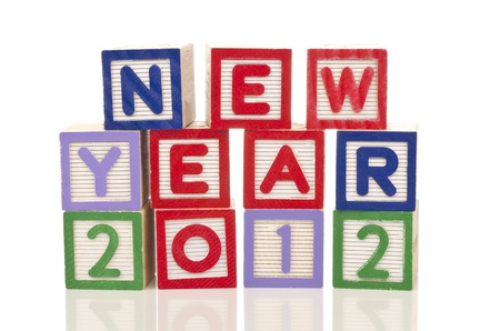 new year 2012 words on colorful wood blocks isolated on white background