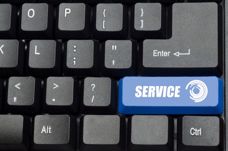 service word on blue and black keyboard buttonの写真素材