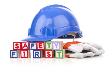 safety first word blocks with personal protective equipment isolated on white backgroundの写真素材