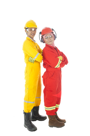 Man and woman standing complete with personal protective equipmentの写真素材