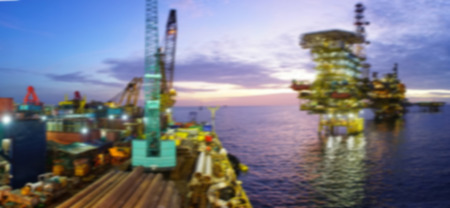 Panorama of motion blur pipelay barge with oil and gas rig platform in the middle of South China Sea during sunrise scene.Construction of production process in the sea. Power energy of the world.の写真素材