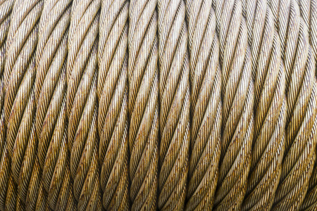 wire rope texture - heavy duty steel wire cable or rope in oily condition for heavy industrial purpose.の写真素材