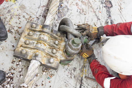 Marine crew doing anchor handling activities with selective focus.の写真素材