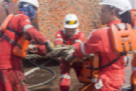 Marine crew doing anchor handling activities with motion blur effect.の写真素材