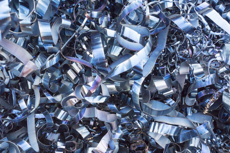 Rusty scrap metal shavings swirls in blue tone.の写真素材