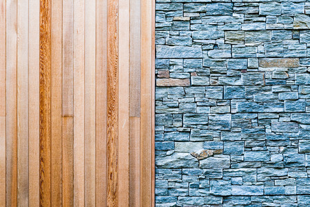 A half and half wood and stone exterior wall. Works as a background or texture. Location: Sweden, Scandinavia.の写真素材