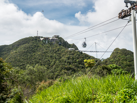 LANGKAWI, MALAYSIA - NOV 25 2015 - Cable cars are taking tourists to the top of Mount Mat Cincang Gunung Mat Cincang to look at the spectacular view.のeditorial素材