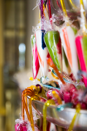 Colorful candy canes hanging in a store in Sweden.の写真素材