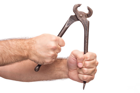 A Man's Hand Holding Pliers  On White Background