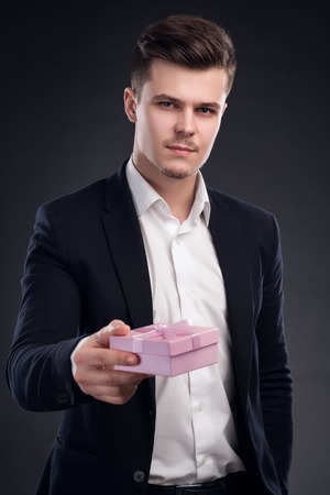 Handsome Man In Suit Present Pink Gift Boxの写真素材