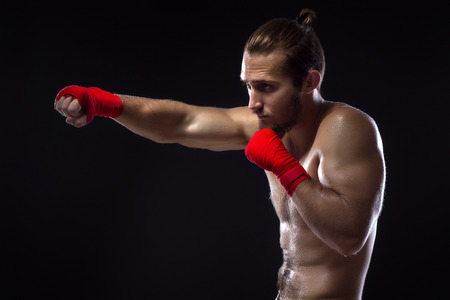 MMA Fighter Practicing Some Kicks