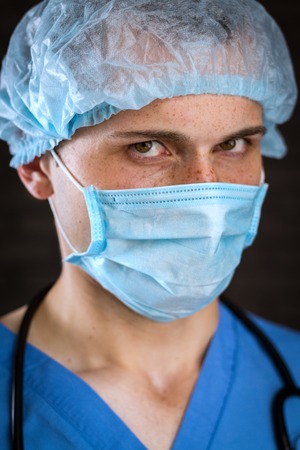 Young Doctor Portrait In Mask