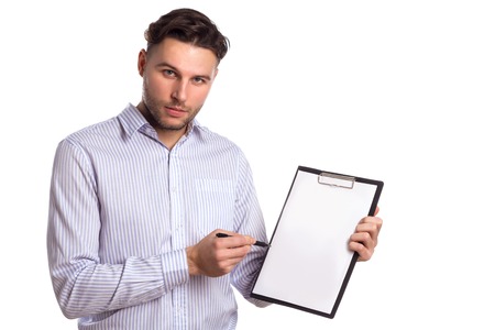 Pensive Young Businessman Holding A Tablet And Pen Isolated On White Background. Business Themeの写真素材